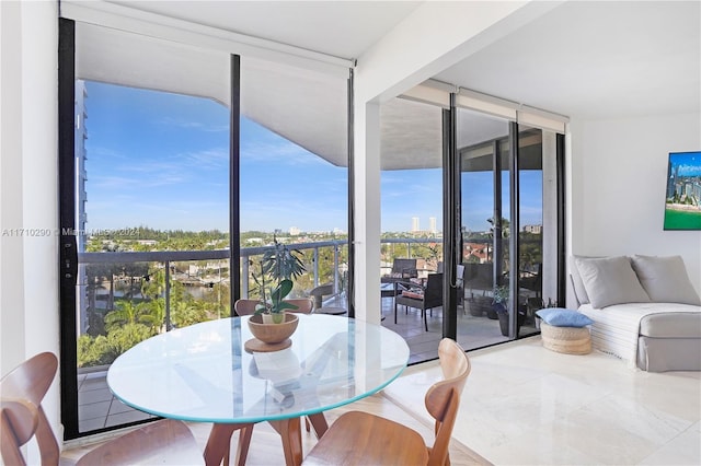 dining room featuring expansive windows