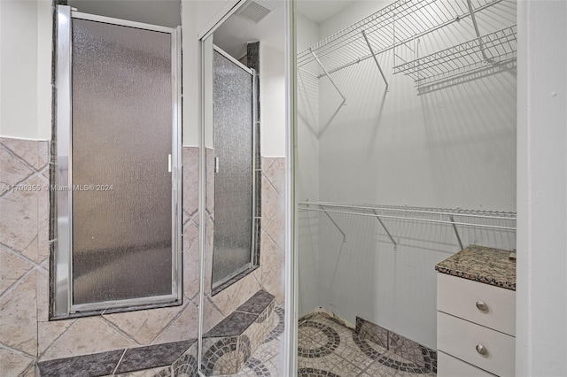 bathroom with tile walls