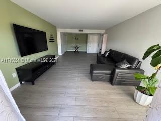 living room with light wood-type flooring