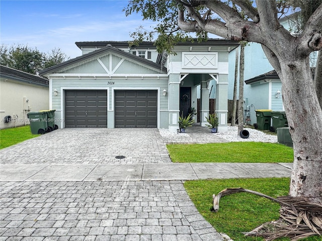 view of front of property with a garage