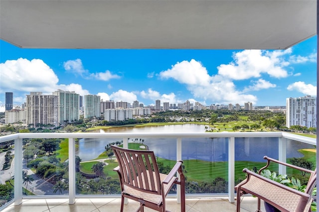 balcony featuring a water view