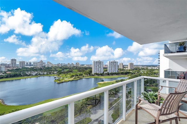 balcony featuring a water view