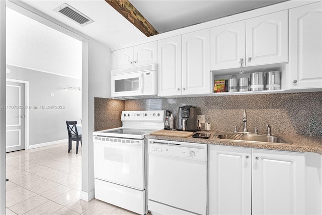 kitchen featuring sink, white appliances, white cabinetry, tasteful backsplash, and beamed ceiling