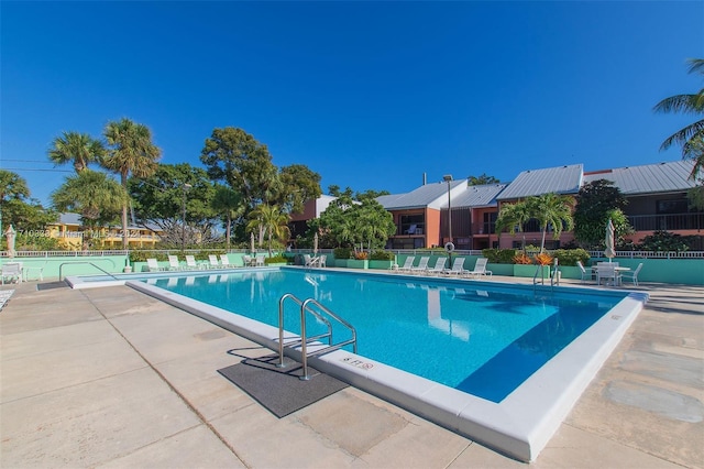 view of swimming pool with a patio area