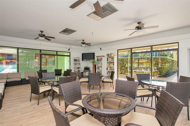 interior space featuring ceiling fan