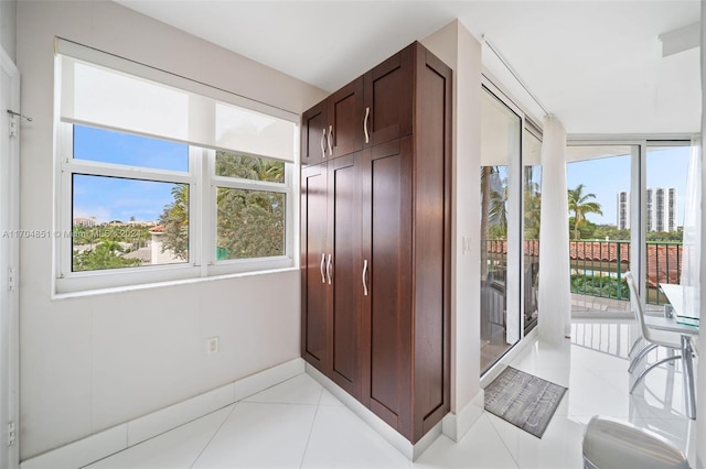 interior space featuring light tile patterned flooring