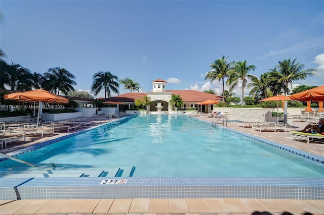 view of swimming pool featuring a patio area