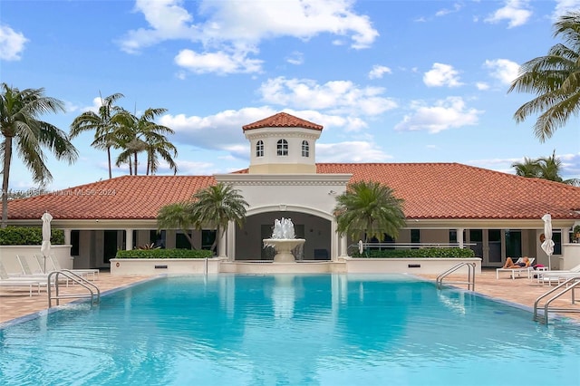 view of swimming pool featuring a patio