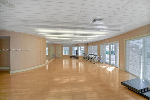 interior space featuring french doors and light hardwood / wood-style floors