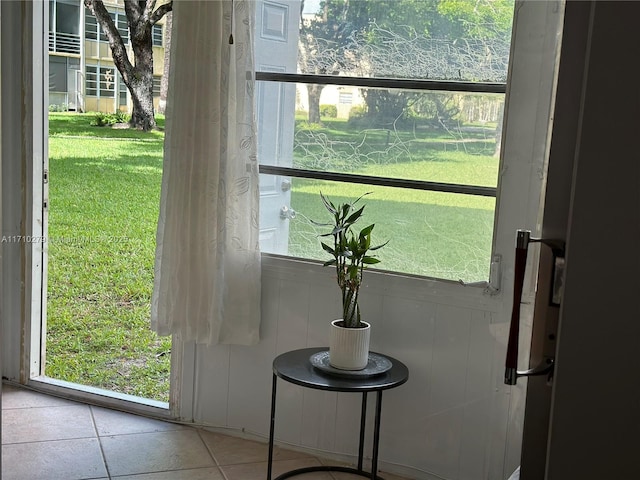 entryway featuring light tile patterned floors