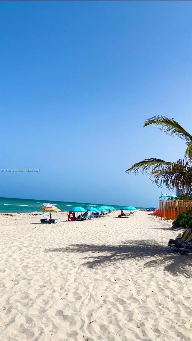 property view of water with a beach view