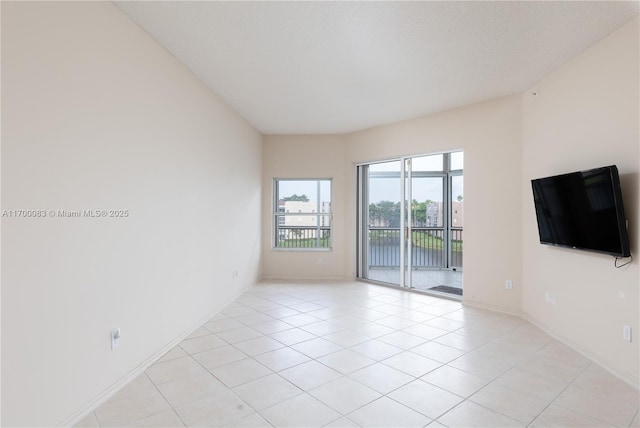 view of tiled empty room