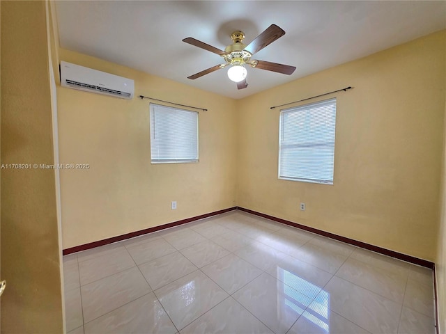 tiled spare room with ceiling fan and a wall mounted AC