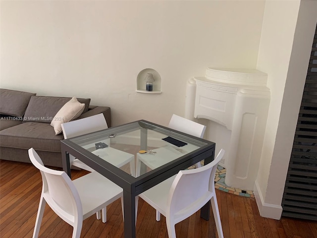 dining area with wood-type flooring