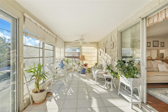 sunroom / solarium with ceiling fan