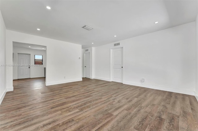 unfurnished room featuring wood-type flooring