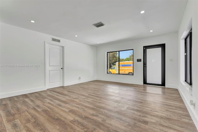 empty room featuring light hardwood / wood-style floors