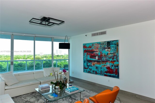 2127 Brickell Ave Unit 1005, Miami, FL 33129 - living room with baseboards