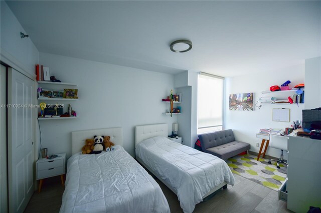2127 Brickell Ave Unit 1005, Miami, FL 33129 - bedroom with wood finished floors