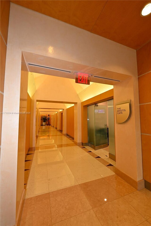 2127 Brickell Ave Unit 1005, Miami, FL 33129 - hall featuring elevator and baseboards