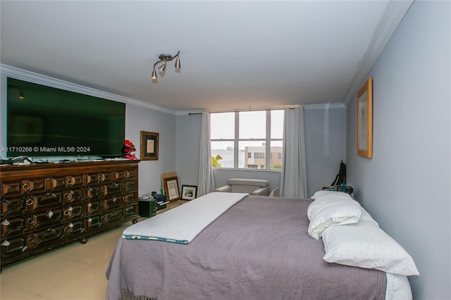 bedroom with crown molding