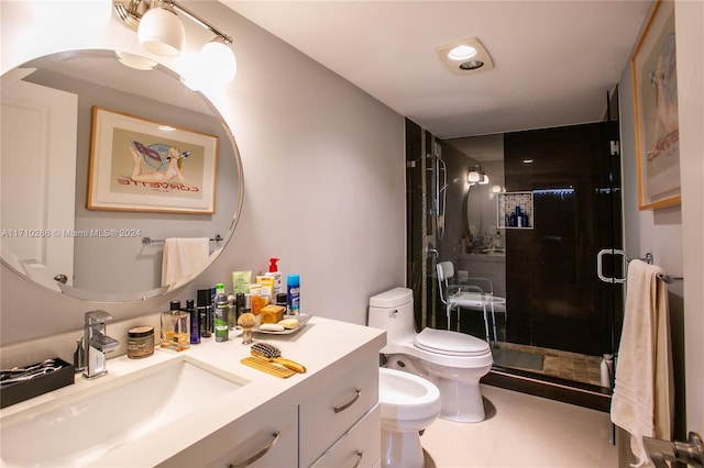 bathroom featuring vanity, toilet, a bidet, and a shower with shower door