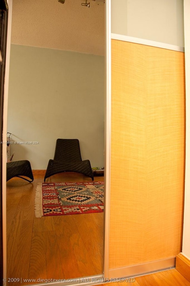 bedroom featuring hardwood / wood-style floors