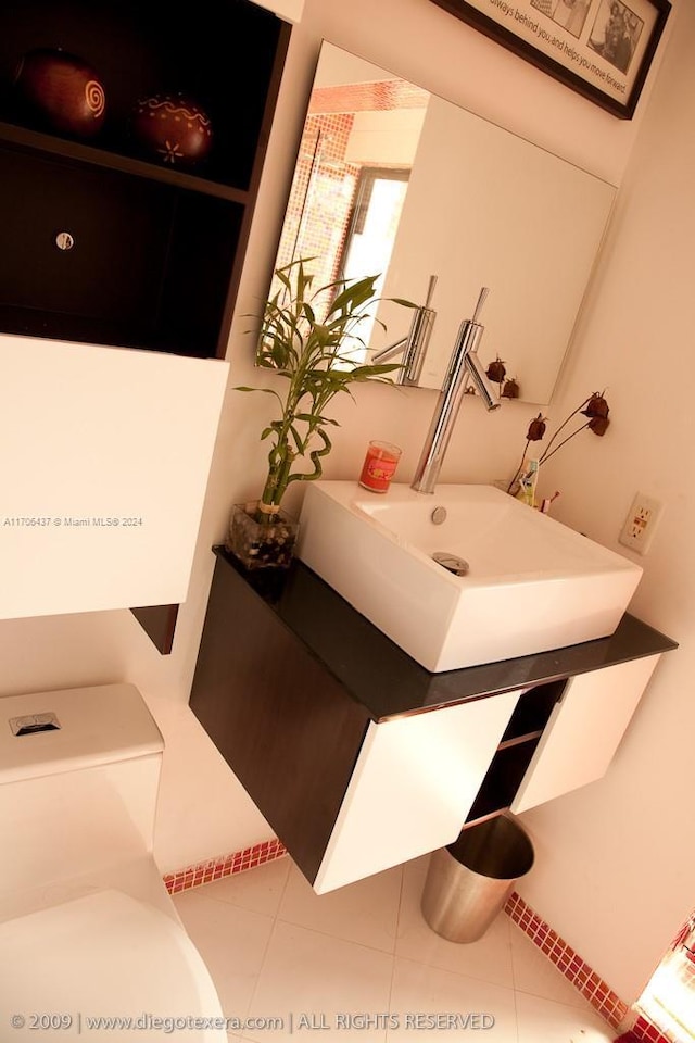 bathroom featuring tile patterned floors and sink