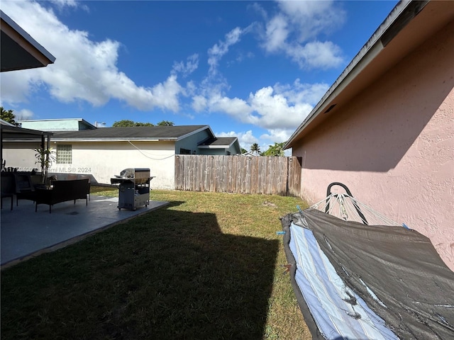 view of yard with a patio area