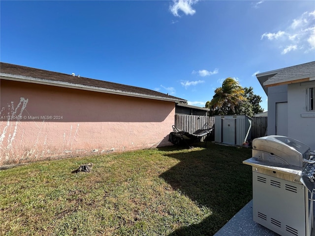 view of yard with a shed