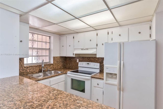 kitchen with white cabinets, white appliances, and sink