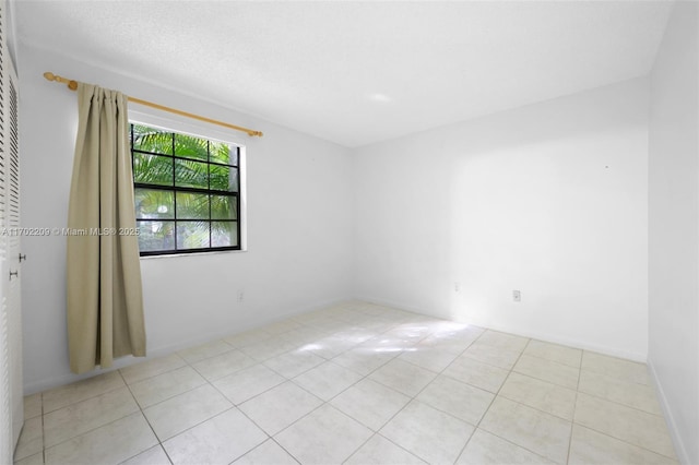 view of tiled spare room