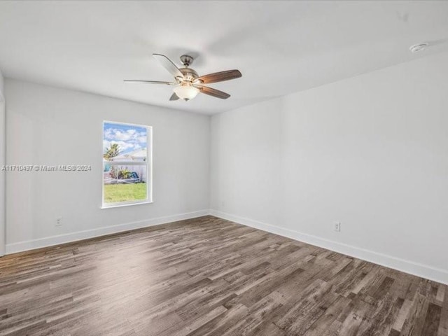 unfurnished room featuring hardwood / wood-style floors and ceiling fan