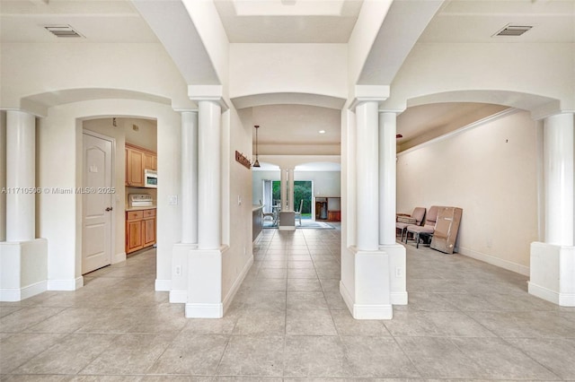 foyer with ornate columns