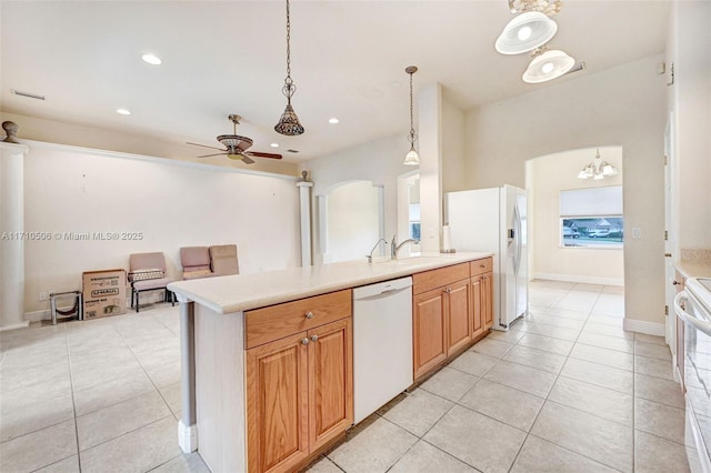 kitchen featuring ceiling fan, white appliances, light tile patterned floors, and hanging light fixtures