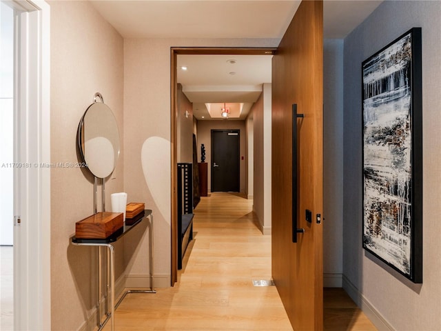 851 NE 1st Ave Unit 1212, Miami, FL 33132 - hallway featuring light wood-type flooring and recessed lighting
