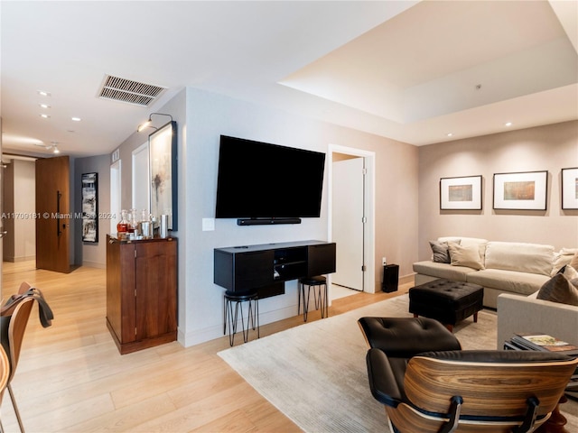 living room with light hardwood / wood-style floors