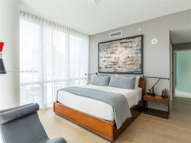 bedroom featuring light hardwood / wood-style flooring