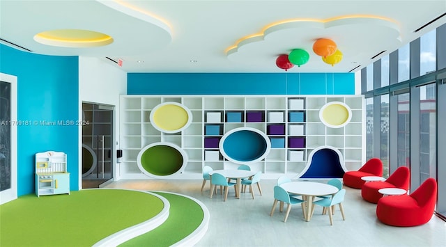 playroom with a wall of windows