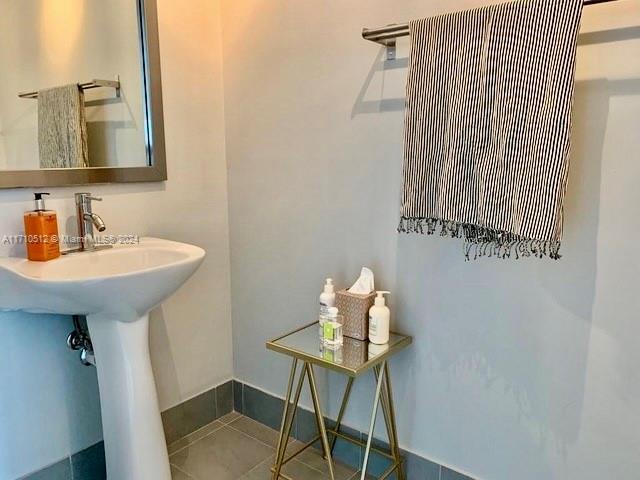 bathroom featuring tile patterned flooring