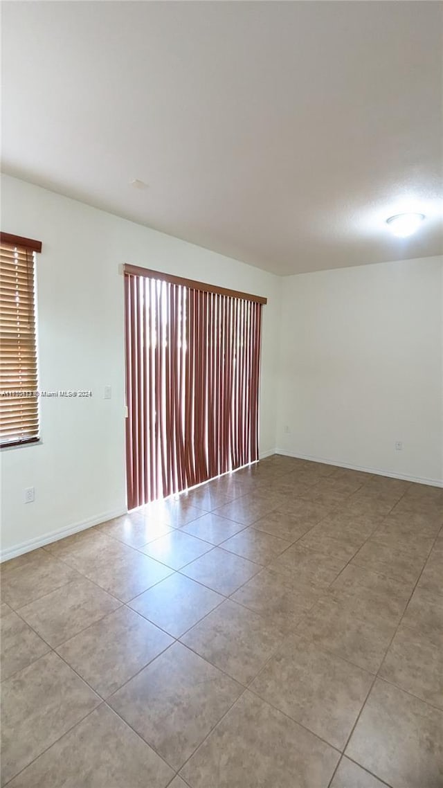 view of tiled empty room