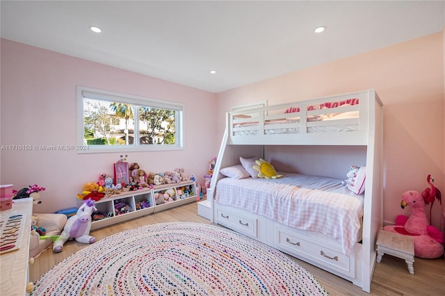 bedroom with light hardwood / wood-style flooring