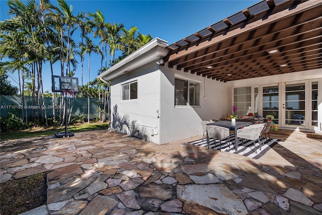 view of patio featuring french doors