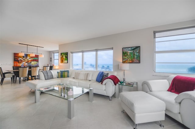 living area featuring light tile patterned floors