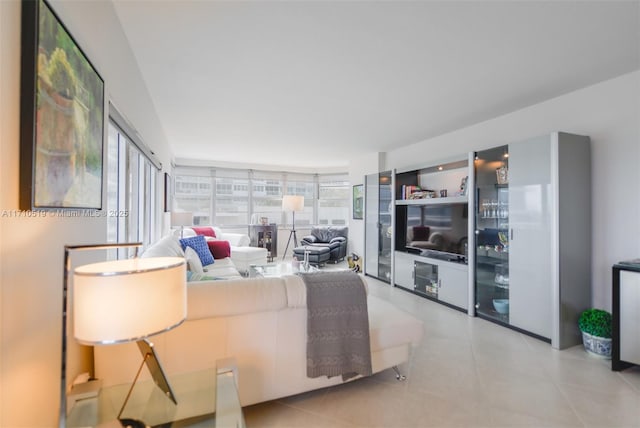 living area with light tile patterned flooring