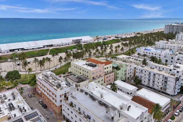 bird's eye view featuring a water view and a view of the beach