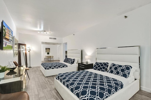 bedroom featuring light hardwood / wood-style flooring