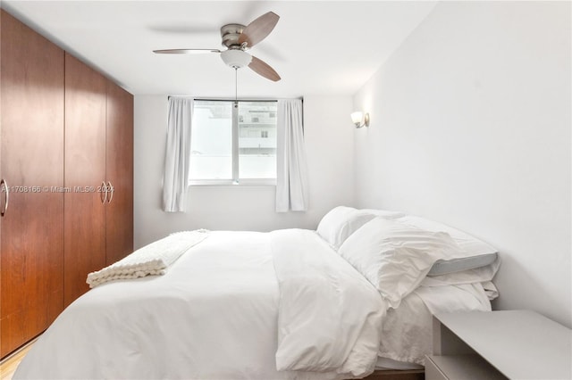 bedroom featuring a closet and ceiling fan