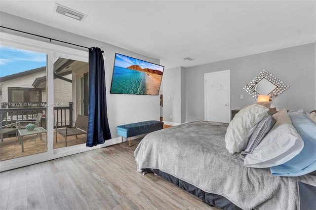 bedroom featuring wood-type flooring