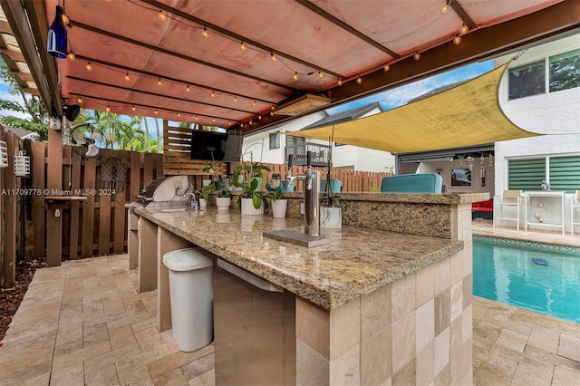 view of patio / terrace featuring a fenced in pool and a pergola